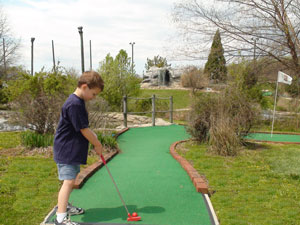 Boy Golfing